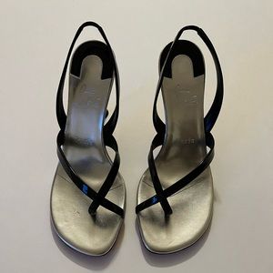 CHRISTIAN LOUBOUTIN
Taralita 85 patent-leather slingback sandals